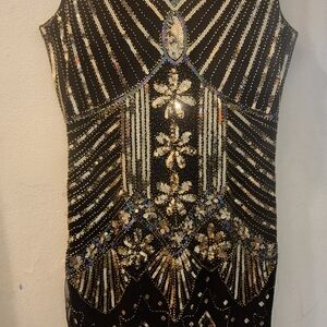 Elegant Black and Gold Embellished Midi Dress